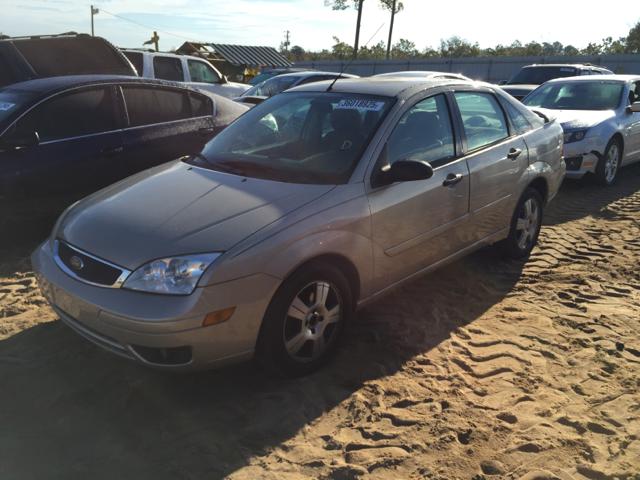 1FAFP34N06W134774 - 2006 FORD FOCUS ZX4 GOLD photo 10
