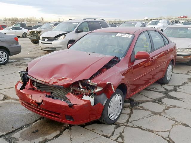 KL5JD56Z26K389769 - 2006 SUZUKI FORENZA RED photo 2