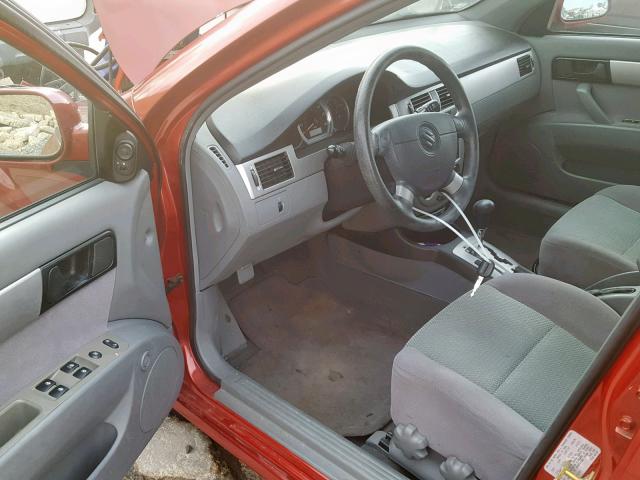 KL5JD56Z26K389769 - 2006 SUZUKI FORENZA RED photo 9