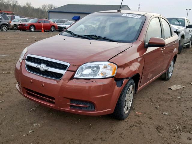 KL1TD5DE4BB215206 - 2011 CHEVROLET AVEO LS ORANGE photo 2