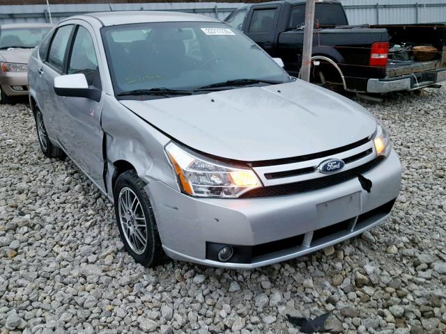 1FAHP3FN0BW199317 - 2011 FORD FOCUS SILVER photo 1