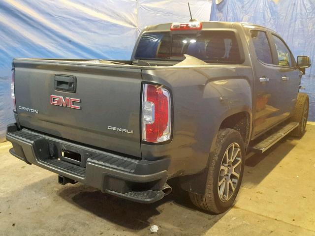 1GTG6EEN7H1172112 - 2017 GMC CANYON DEN GREEN photo 4