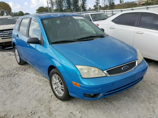 1FAHP37N57W199545 - 2007 FORD FOCUS ZX5 BLUE photo 1