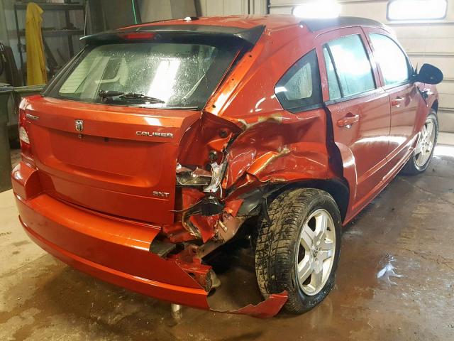 1B3HB48A59D165843 - 2009 DODGE CALIBER SX ORANGE photo 4