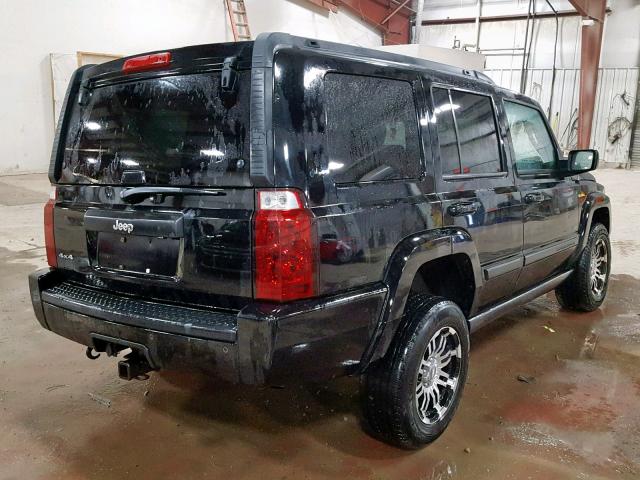 1J8HG48K97C620102 - 2007 JEEP COMMANDER BLACK photo 4