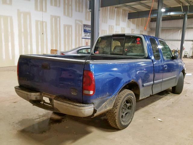 1FTDX1762VNB80329 - 1997 FORD F150 BLUE photo 4