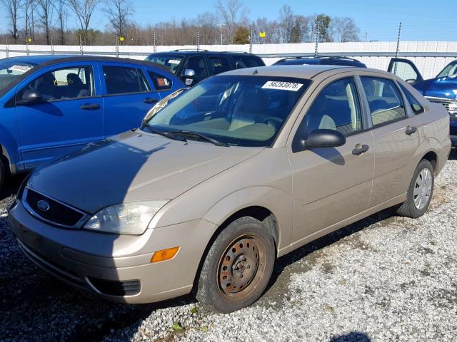 1FAFP34NX7W244443 - 2007 FORD FOCUS ZX4 GOLD photo 2