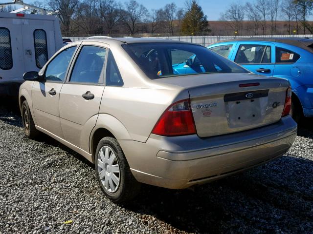 1FAFP34NX7W244443 - 2007 FORD FOCUS ZX4 GOLD photo 3