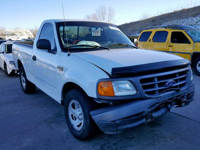 2FTRF17204CA11338 - 2004 FORD F-150 HERI WHITE photo 1