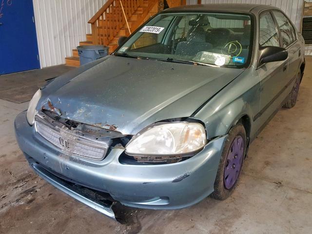 2HGEJ6675XH591914 - 1999 HONDA CIVIC LX ლურჯი ფოტო 2