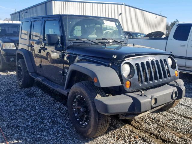 1J4GA39149L781734 - 2009 JEEP WRANGLER U BLACK photo 1