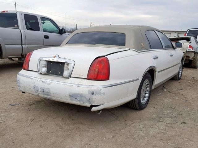 1LNHM83W7XY645371 - 1999 LINCOLN TOWN CAR C WHITE photo 4