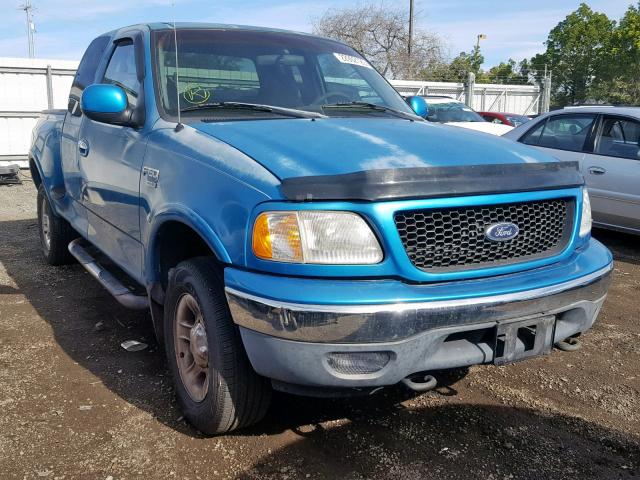 1FTRX08W1XKA39156 - 1999 FORD F150 BLUE photo 1