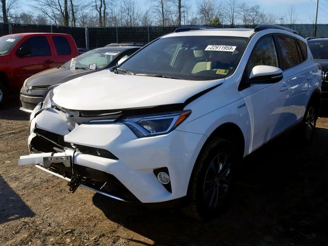 JTMRJREV7HD059984 - 2017 TOYOTA RAV4 HV LE WHITE photo 2