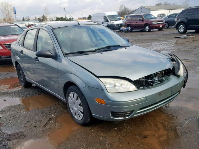 1FAFP34N85W137131 - 2005 FORD FOCUS ZX4 GRAY photo 1