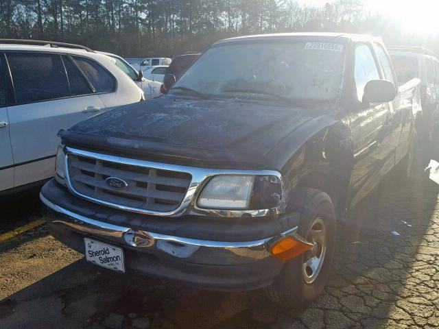 2FTRX17WX4CA88329 - 2004 FORD F-150 HERI BLACK photo 2