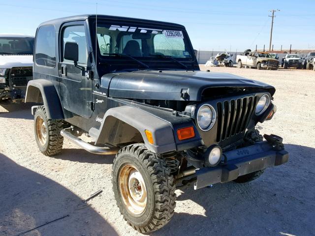 1J4FA49S32P760642 - 2002 JEEP WRANGLER / GRAY photo 1