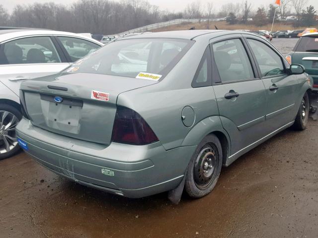 1FAHP34N16W166142 - 2006 FORD FOCUS ZX4 BLUE photo 4