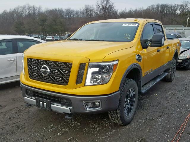 1N6BA1F47HN510573 - 2017 NISSAN TITAN XD S YELLOW photo 2