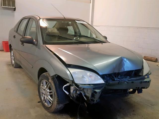 1FAFP34N15W100731 - 2005 FORD FOCUS ZX4 GRAY photo 1