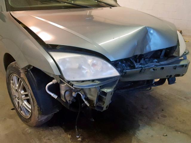 1FAFP34N15W100731 - 2005 FORD FOCUS ZX4 GRAY photo 9