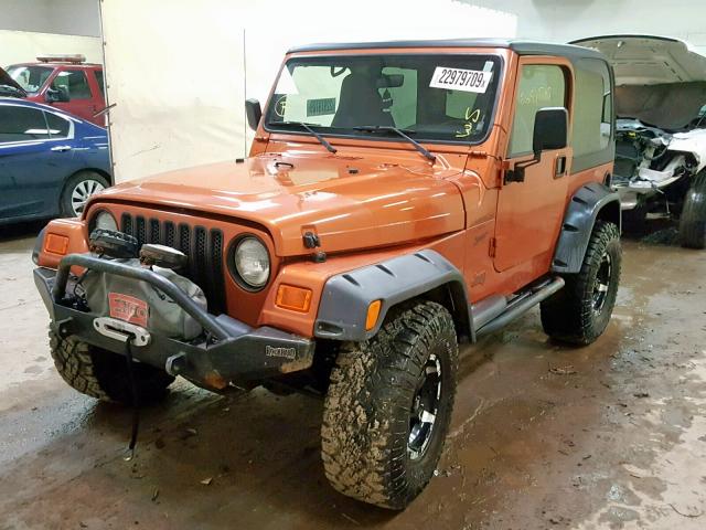 1J4FA49S0YP804329 - 2000 JEEP WRANGLER / ORANGE photo 2