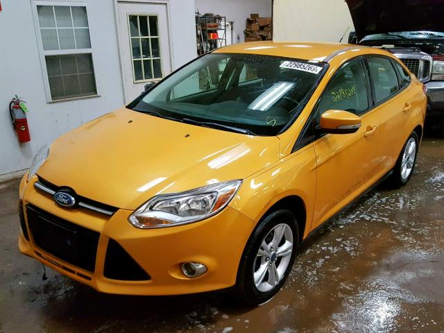 1FAHP3F28CL261944 - 2012 FORD FOCUS SE YELLOW photo 2