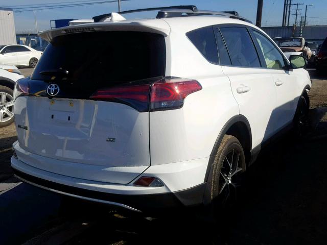 JTMNFREV3JJ188697 - 2018 TOYOTA RAV4 SE WHITE photo 4