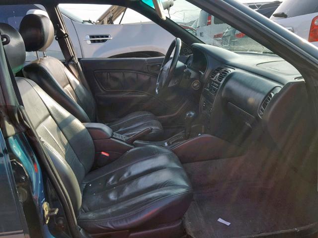 4S3BG685XX7661107 - 1999 SUBARU LEGACY OUT GREEN photo 5