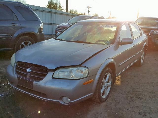 JN1CA31D0YT707996 - 2000 NISSAN MAXIMA GLE BEIGE photo 2