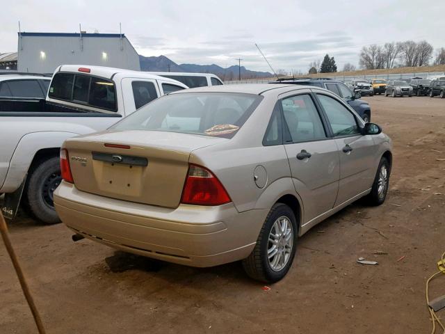 1FAFP34N17W130203 - 2007 FORD FOCUS ZX4 GOLD photo 4
