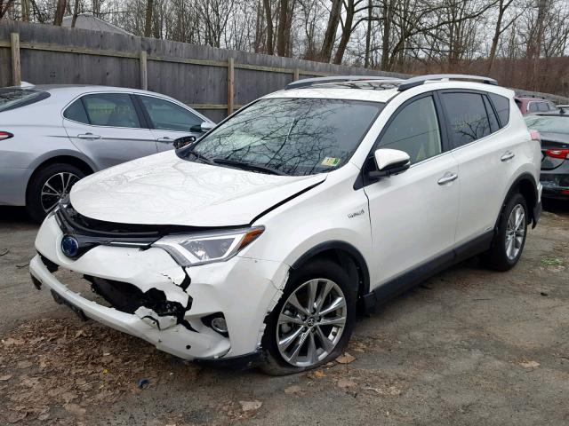 JTMDJREV1JD190019 - 2018 TOYOTA RAV4 HV LI WHITE photo 2