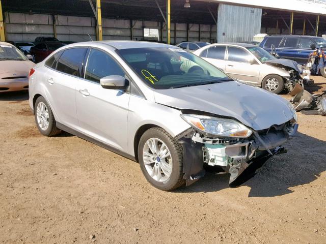 1FAHP3H22CL237460 - 2012 FORD FOCUS SEL SILVER photo 1