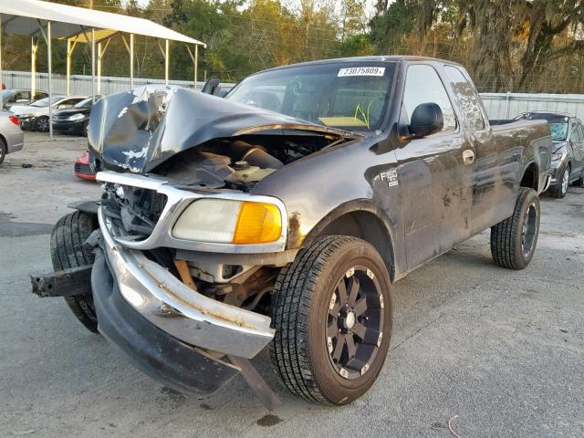 2FTRX18W54CA47413 - 2004 FORD F-150 HERI BLACK photo 2