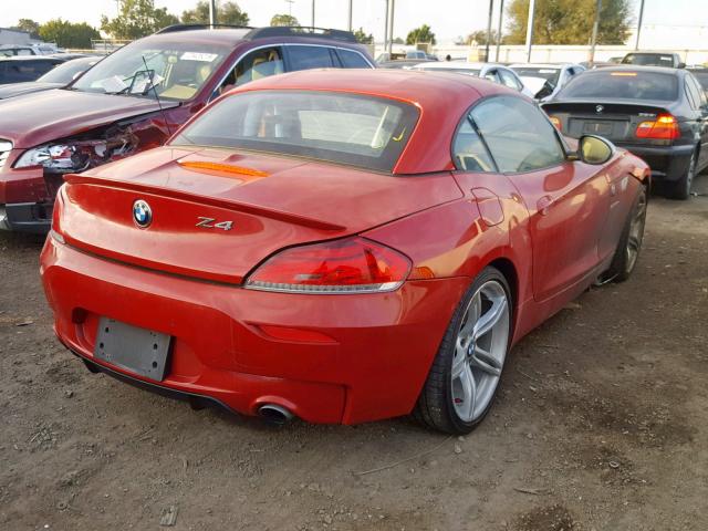 WBALM1C52BE393856 - 2011 BMW Z4 SDRIVE3 RED photo 4