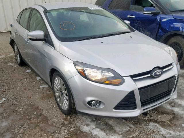 1FAHP3J25CL431989 - 2012 FORD FOCUS TITA SILVER photo 1