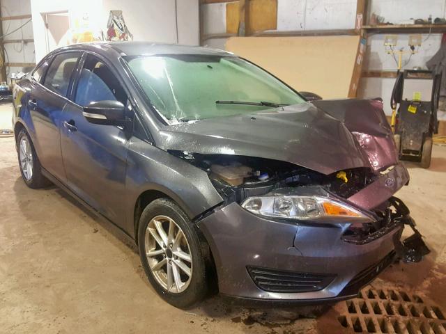 1FADP3F27FL202127 - 2015 FORD FOCUS SE GRAY photo 1