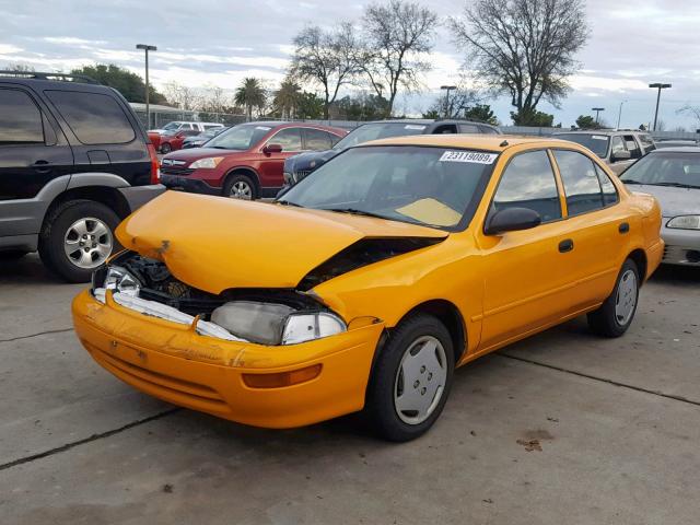 1Y1SK5267TZ029749 - 1996 GEO PRIZM BASE YELLOW photo 2