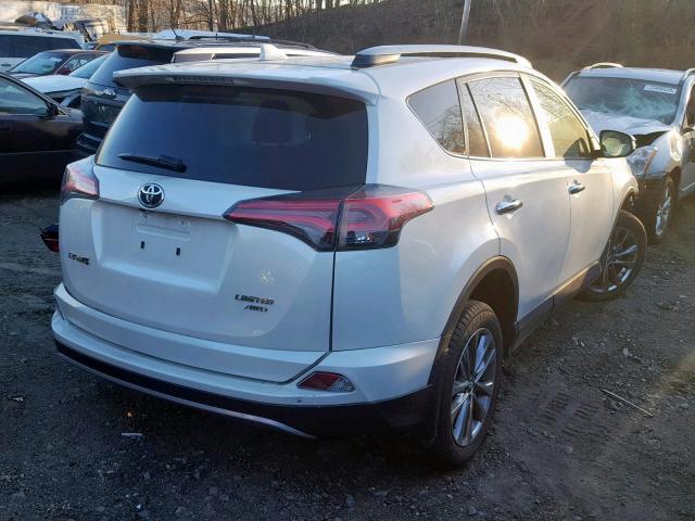 JTMDFREV5HJ713054 - 2017 TOYOTA RAV4 LIMIT WHITE photo 4