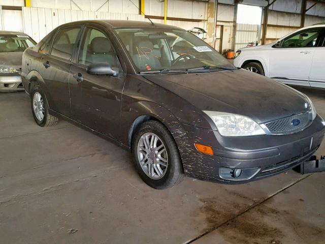 1FAFP34NX5W241314 - 2005 FORD FOCUS ZX4 GRAY photo 1