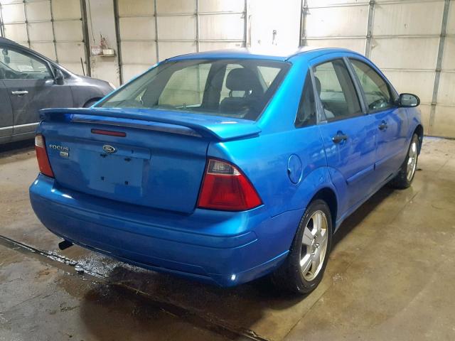 1FAHP34N37W364075 - 2007 FORD FOCUS ZX4 BLUE photo 4