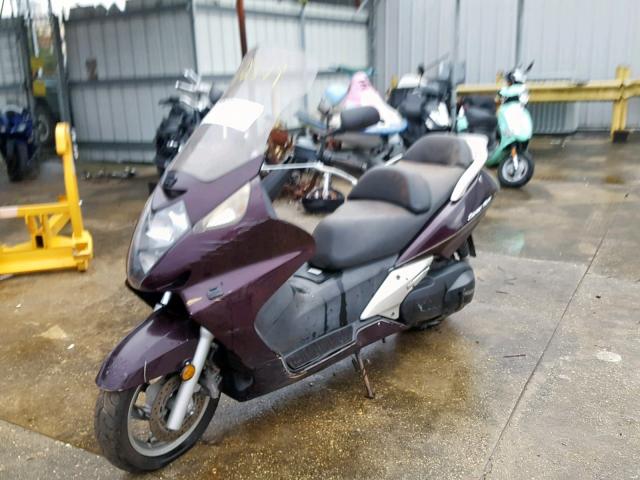 JH2PF011X4K202124 - 2004 HONDA FSC600 D PURPLE photo 2