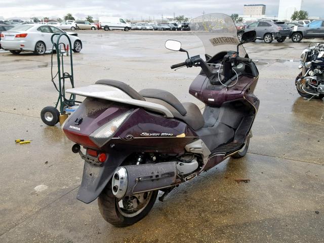 JH2PF011X4K202124 - 2004 HONDA FSC600 D PURPLE photo 4