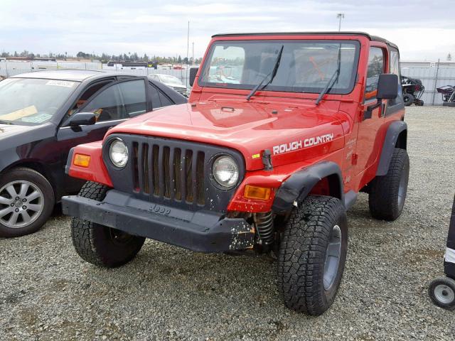 1J4FA49S0YP801785 - 2000 JEEP WRANGLER / RED photo 2