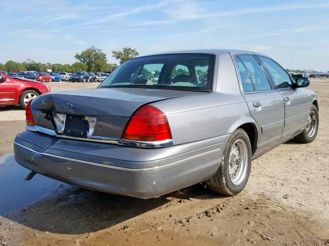 2FAFP74W1XX159043 - 1999 FORD CROWN VICT GRAY photo 4