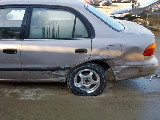 1Y1SK52831Z440516 - 2001 CHEVROLET GEO PRIZM BEIGE photo 9