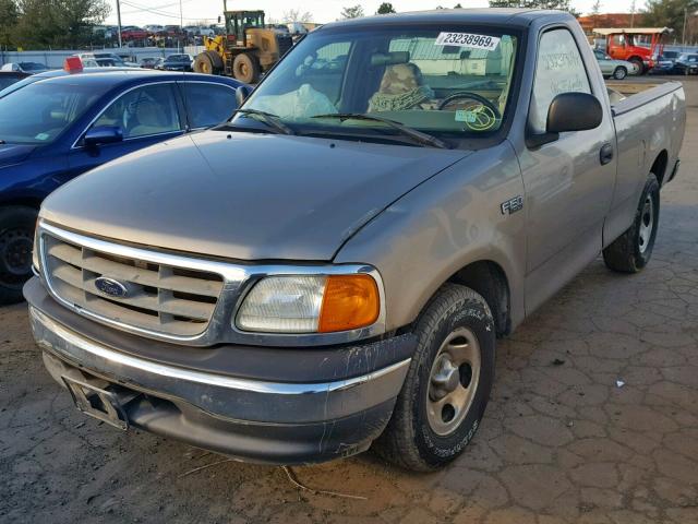 2FTRF17214CA85917 - 2004 FORD F-150 HERI TAN photo 2