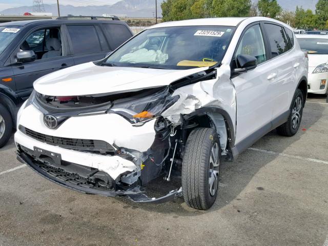 2T3ZFREV8JW489338 - 2018 TOYOTA RAV4 LE WHITE photo 2