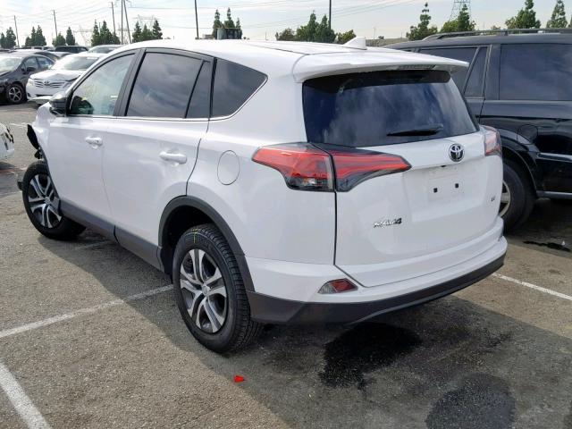 2T3ZFREV8JW489338 - 2018 TOYOTA RAV4 LE WHITE photo 3