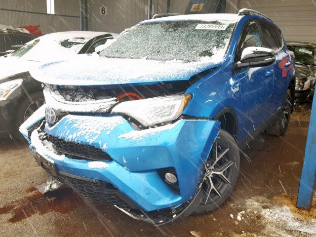 JTMJJREV4HD084662 - 2017 TOYOTA RAV4 HV SE BLUE photo 2